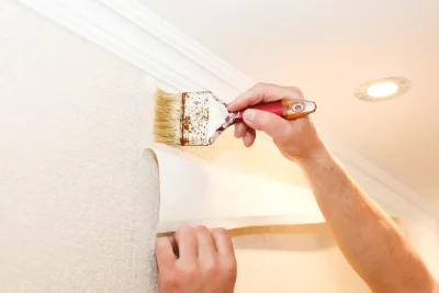 Pose de papier peint aux Pinthières — revêtements muraux et toiles de verre